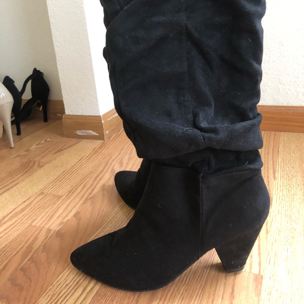 Black below the knee boots